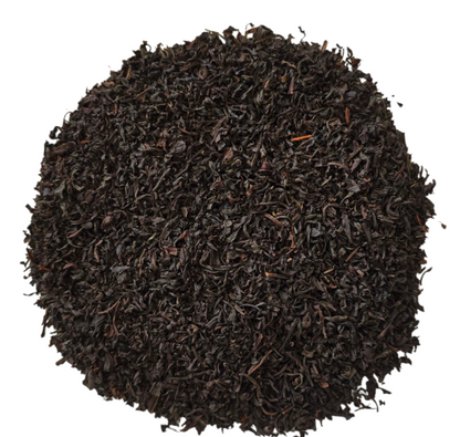 A pile of loose black tea leaves.