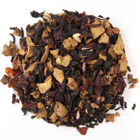 Assorted dried tea leaves on a white background