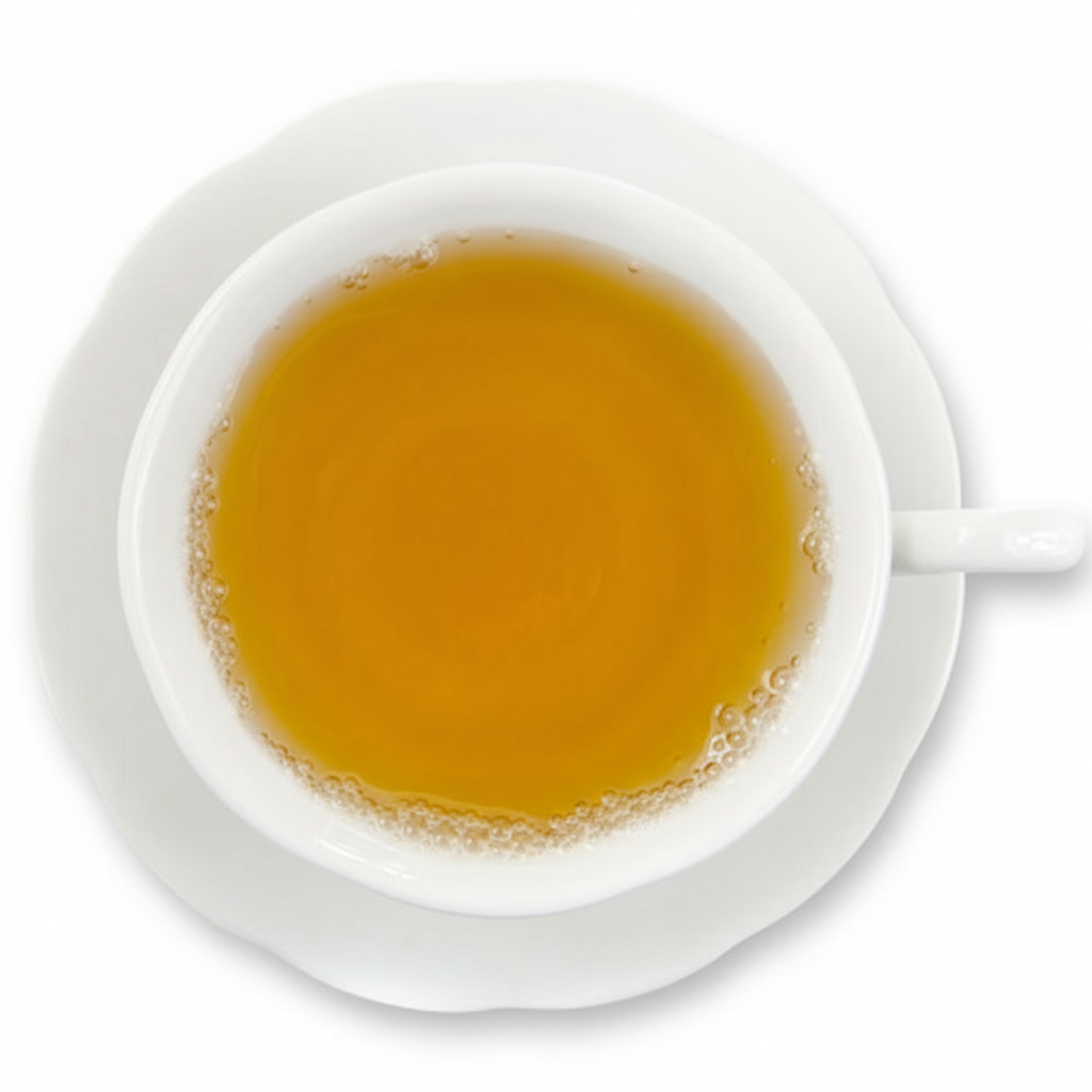 White cup and saucer with a steaming yellowish beverage on a white background